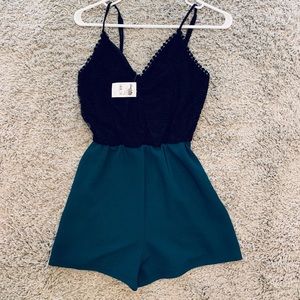 Black lace and teal romper. Never worn.